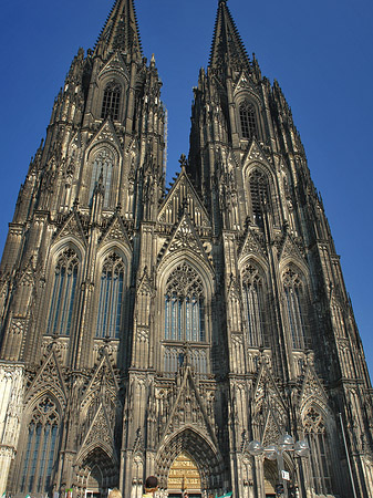 Menschen beim Kölner Dom Fotos